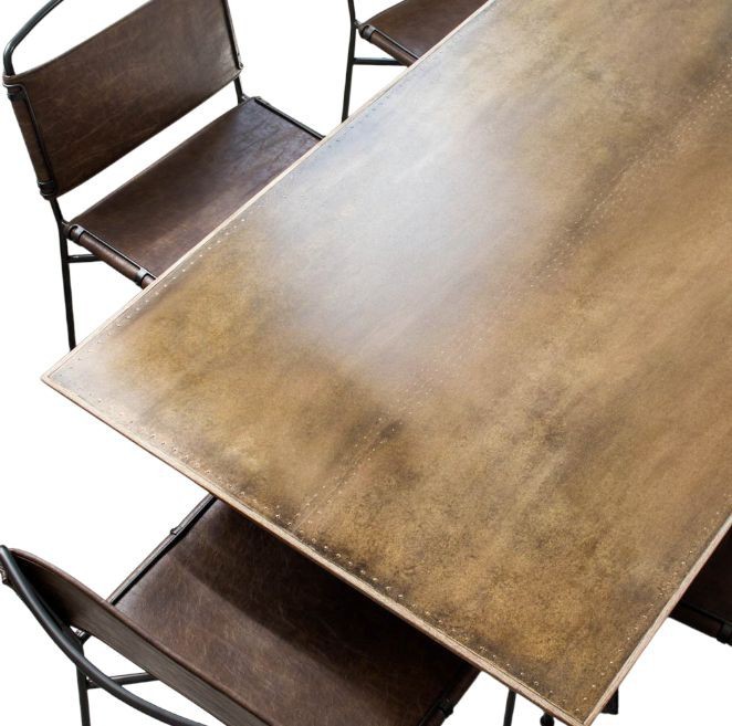 Rare Four Hands Spider Dining Table, a masterpiece of industrial-modern design.